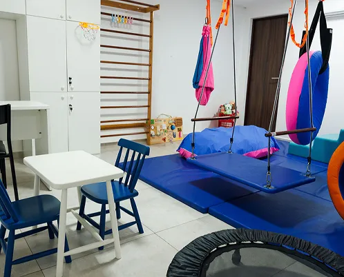 Child and therapist working together